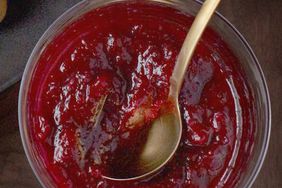 Overhead view of a small bowl of cranberry, ginger, and orange chutney.