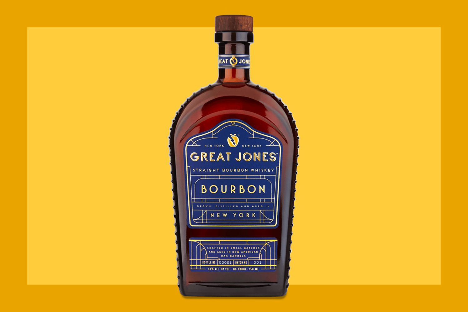  A bottle of Great Jones Bourbon on a mustard colored background. 