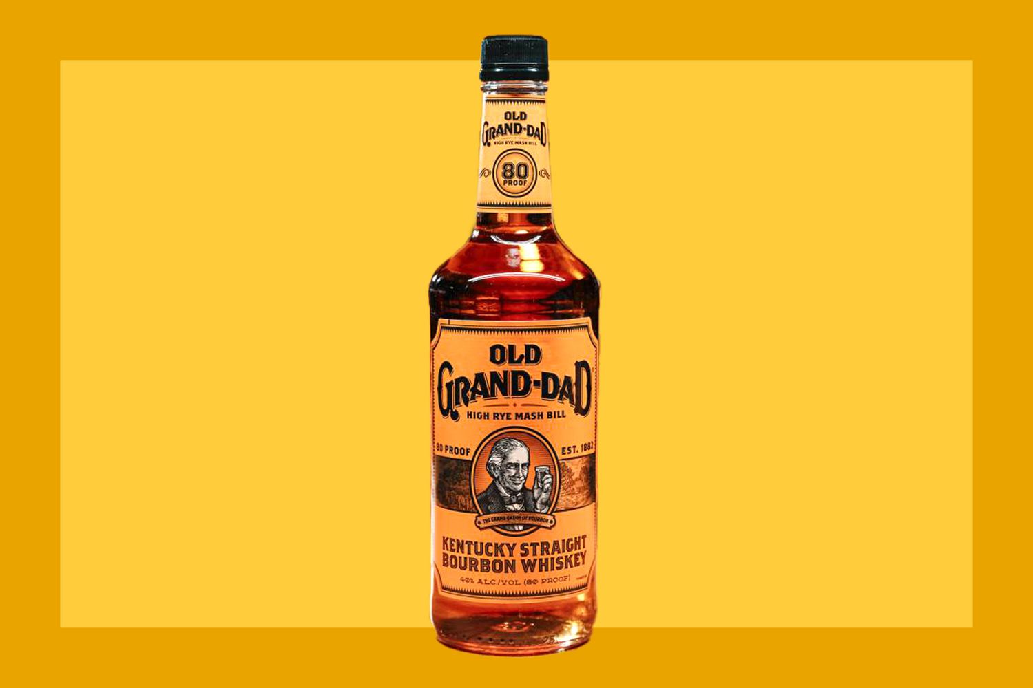 A bottle of Old Grand Dad Bourbon on a mustard colored background. 