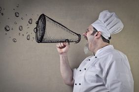 chef shouting on megaphone