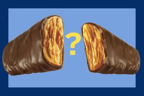 A yellow question mark between two pieces of a Butterfinger chocolate bar. 