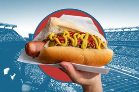 A hand holding a hot dog over a red ellipse and a blue tinted image of a football game in the background. 