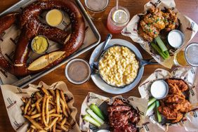 Top down view of various dishes at Jake Melnick's Corner Tap in Chicago.