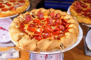 A pepperoni pizza with a mountainous crust from Beau Jo's.