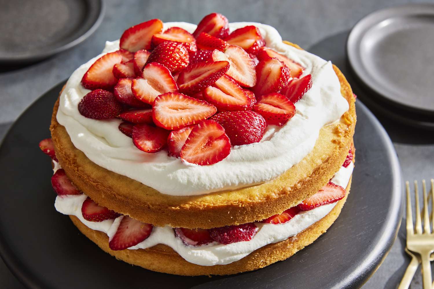 Country cake with strawberries and whipped cream