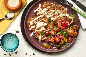 crispy sesame chicken schnitzel with tomato salad and tahini