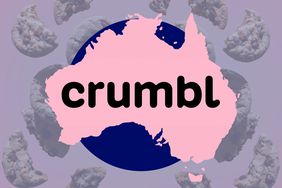 The crumbl logo on a map of Australia above a background of falling cookie pieces. 