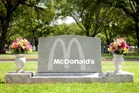 The McDonald's logo on a gravestone.