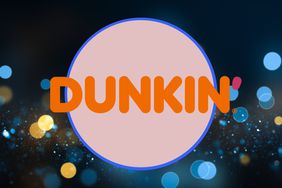 The Dunkin logo over blue lights. 