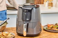 The Ninja 4-Quart Air Fryer on a kitchen countertop