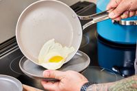 An egg cooked in the GreenPan Nova Ceramic Nonstick 10-Piece Cookware Set pan is plated