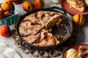 table setting with baked dessert in the cast iron skillet