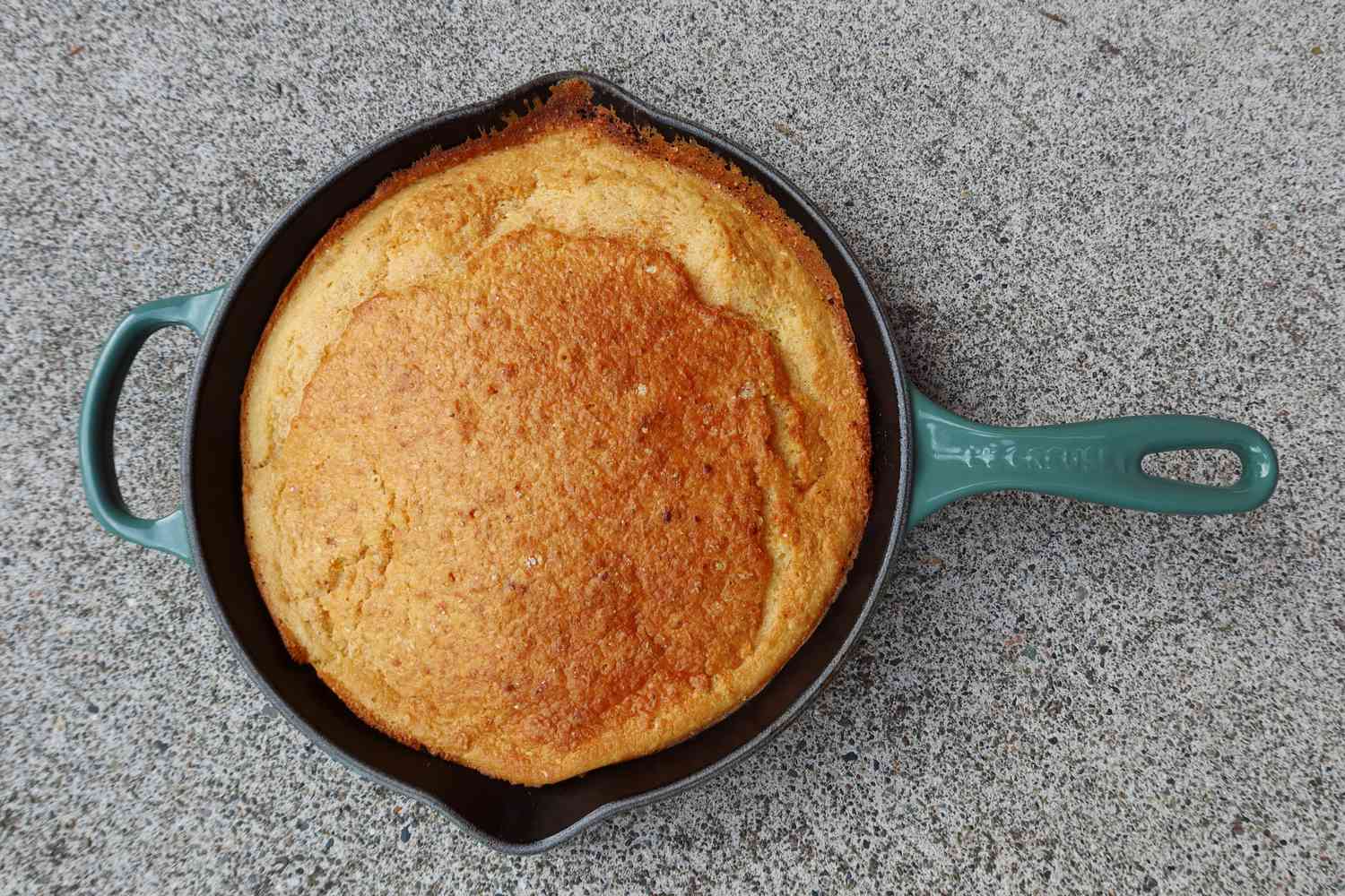 Le Creuset Classic Cast Iron Handle Skillet with cooked cake inside