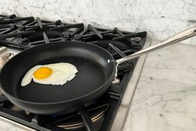 An egg is cooked in the All-Clad HA1 Hard Anodized Nonstick Fry Pan