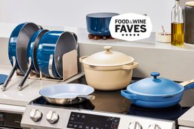 two blue cookware sets on a stove