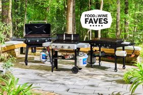 A variety of flat top griddles in a backyard patio