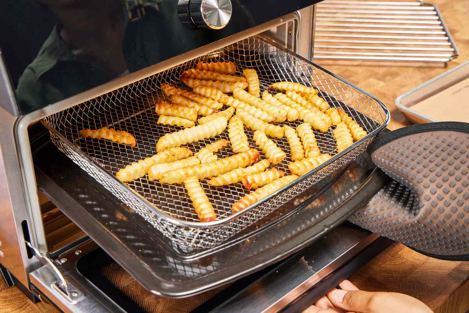 Cooking French fries in the Instant Omni Plus Air Fryer Toaster Oven