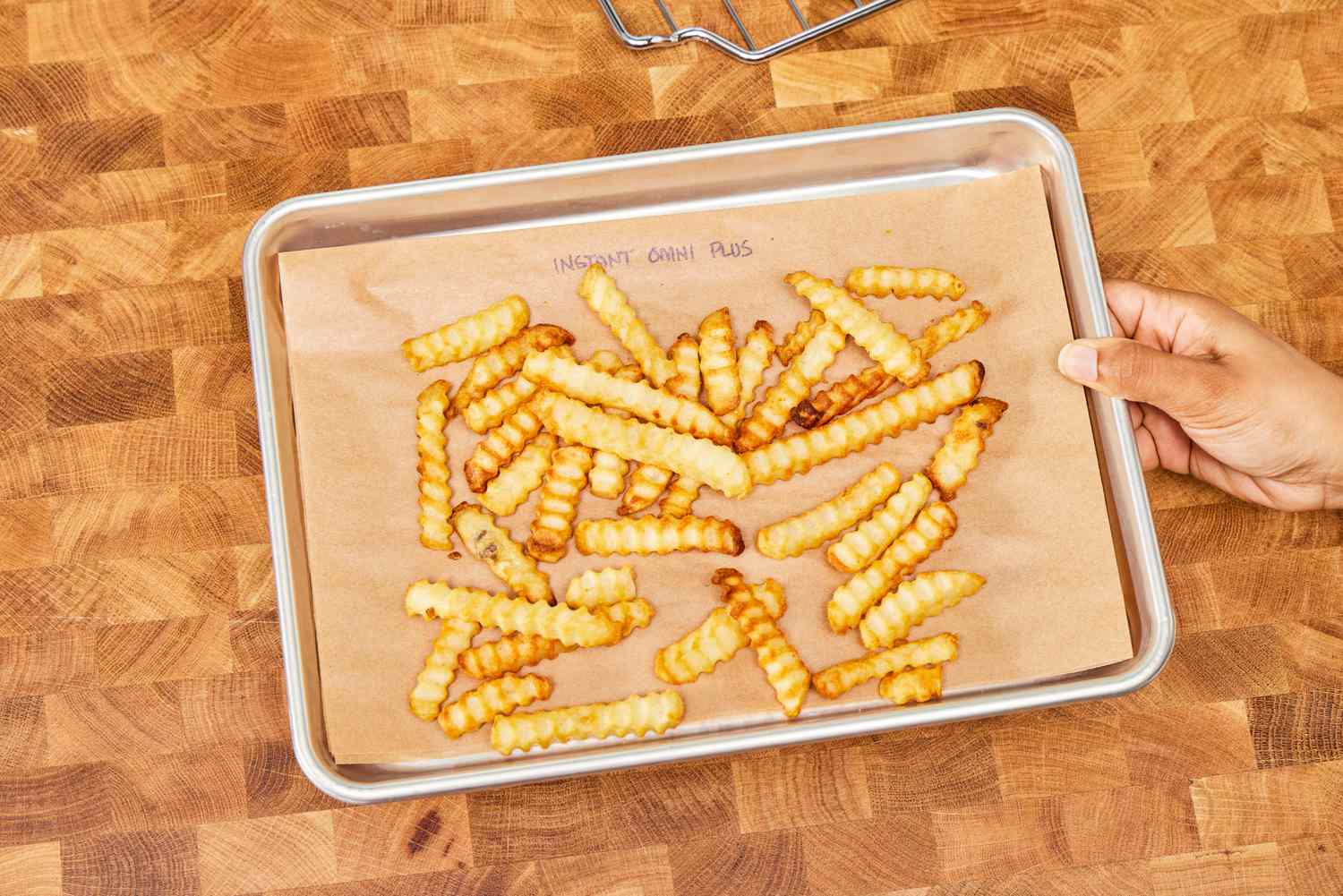 A tray of French fries cooked in the Instant Omni Plus Air Fryer Toaster Oven