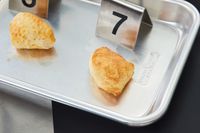 Baked biscuits displayed on a metal tray