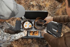 people camping using yeti skillet