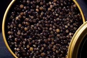 A close up of caviar in a tin.