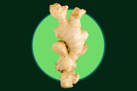 A ginger root on a green background with a lighter green ellipse. 