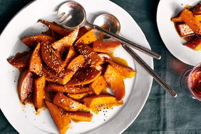 Glazed sweet potatoes with sesame seeds