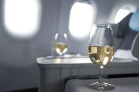 A glass of white wine served on a La Compagnie flight