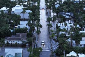 PUNTA GORDA - OCTOBER 10: In this aerial view, Flood waters inundate a neighborhood after Hurricane Milton came ashore on October 10, 2024, in Punta Gorda, Florida. The storm made landfall as a Category 3 hurricane in the Siesta Key area of Florida, causing damage and flooding throughout Central Florida. 