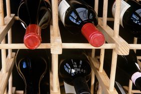 Wine bottles on a wine rack. 