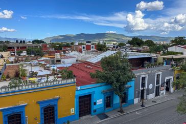 City view of Oaxaca with colorful buildings.