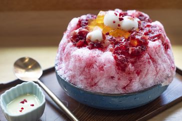 Kakigori, Japanese Style Shaved Ice With Strawberry Sweet Rice Ball and Condensed Milk.