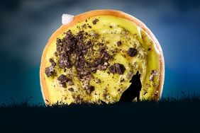 Krispy Kreme’s Supermoon Super Doughnut, an unglazed doughnut filled with cookies & Kreme™ filling, dipped in yellow icing, swirled with chocolate cookie pieces.