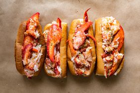 Four lobster rolls in a row from Luke's Lobster in Portland, Maine.