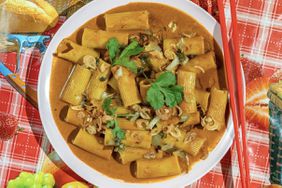 Top down view of yellow curry rigatoni at Holy Basil in Los Angeles.