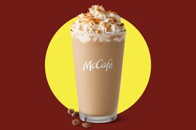 A McDonald's Dulce de Leche Frappé on a yellow and maroon background. 