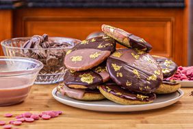 plate of NY Ruby Rye Blacka nd White Cookies with gold leaf