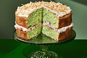 pandan and coconut cake, whole cake with slice cut out