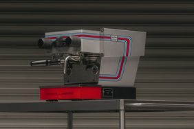 La Marzocco X Porsche espresso machine in the Martini Racing design. The latter pays tribute to the long-standing partnership between Porsche and Martini Racing. The design is inspired by the 911 Carrera RSR, with which Porsche won the legendary Targa Florio endurance race in Sicily in 1973.