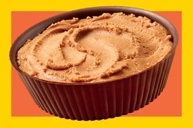 A Reese’s Deconstructed Peanut Butter Cup on an orange and yellow bordered background. 