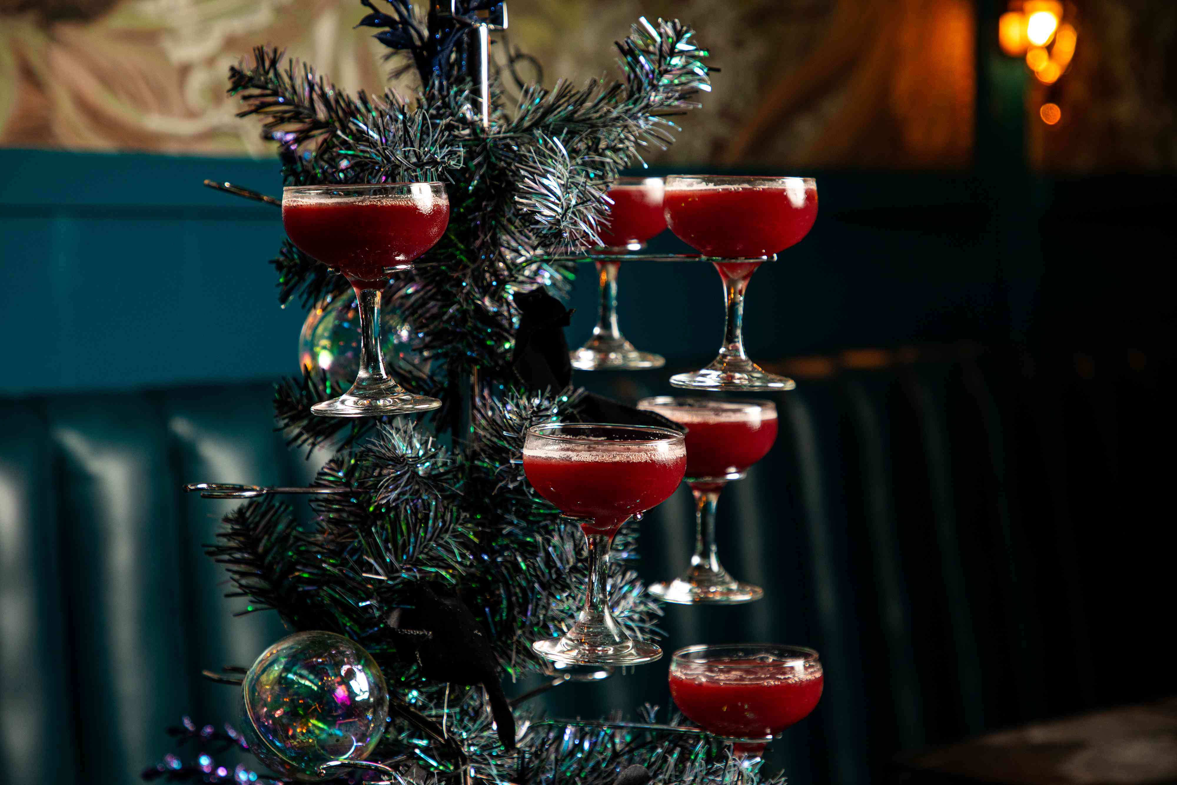 Peacock Room Holiday Cocktails on a small Christmas tree. 