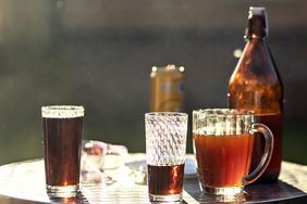 Drinks outside on a silver table. 