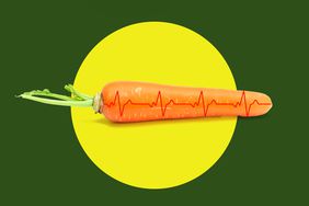 A carrot with ECG lines on a yellow and green background. 