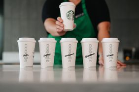 Starbucks alternative milks in different paper cups. 