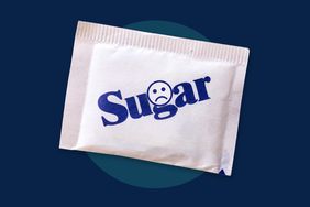 A sugar packet with a sad face icon, on a blue background 