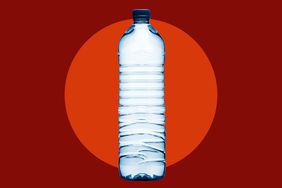 A water bottle on a red background. 