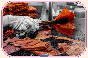 Thin meat slices on grill