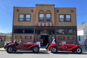 Exterior of Arcangeli Grocery Co. with vintage cars in Pescardero, California.