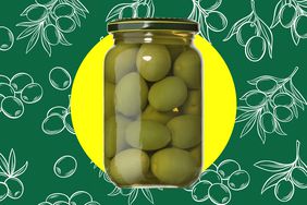 A jar of olives over a green background of illustrated olives. 