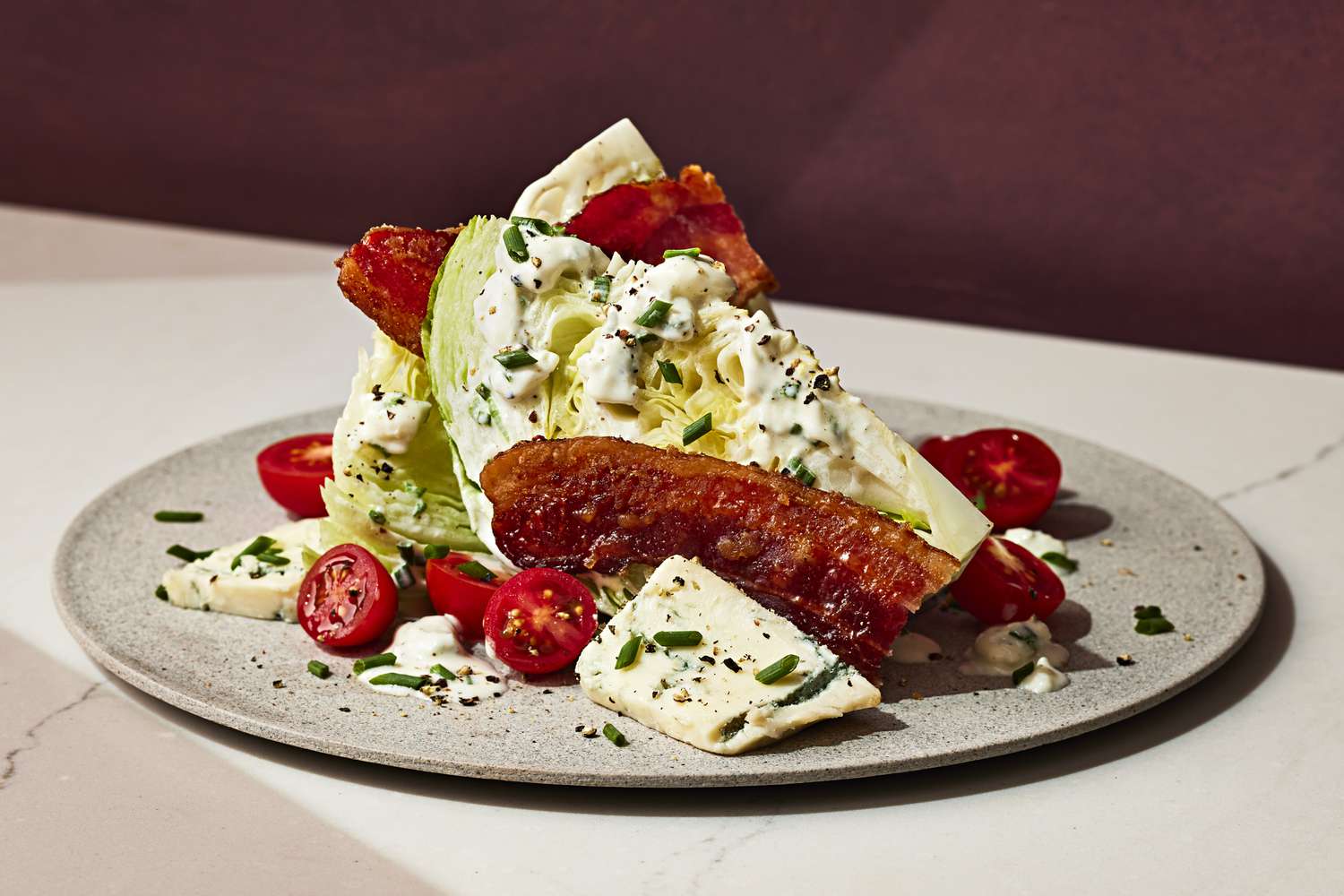 WEDGE SALAD WITH CANDIED BACON AND GORGONZOLA DRESSING, single serving